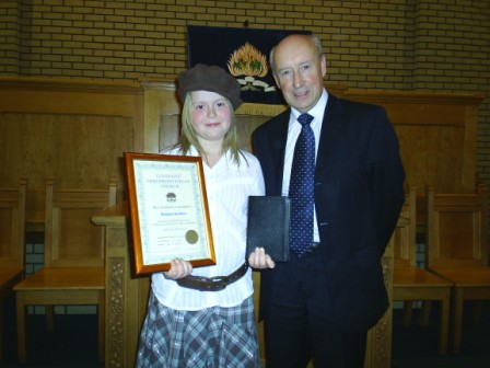 Megan Archer, a pupil of Coleraine Free Presbyterian Church Sabbath School, successfully answered every question in the Child's Catechism.  To mark this achievement she was presented with a certificate, Bible and a gift of �20.  <br>